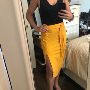 Yellow skirt with thigh slit and tie